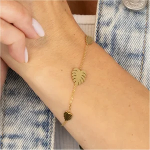 Bransoletka damska ze stali chirurgicznej powlekana złotem z motywem listka